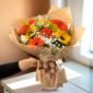 buque de flores gerberas e girassois